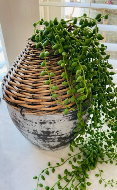 RATTAN AND CLAY VASE